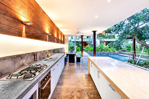 Outdoor Kitchen with Stove and Swimming Pool